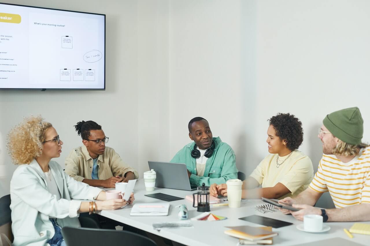 People Having a Meeting at the Office Workspace